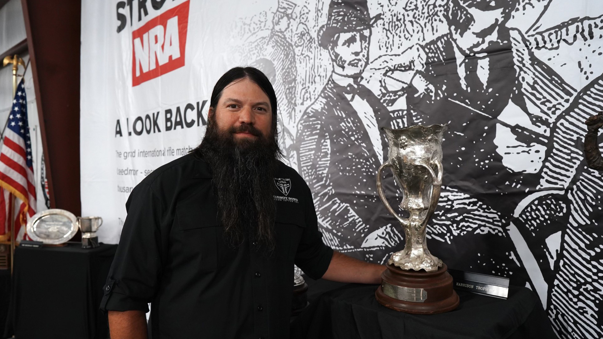 Jon Shue with Harrison Trophy