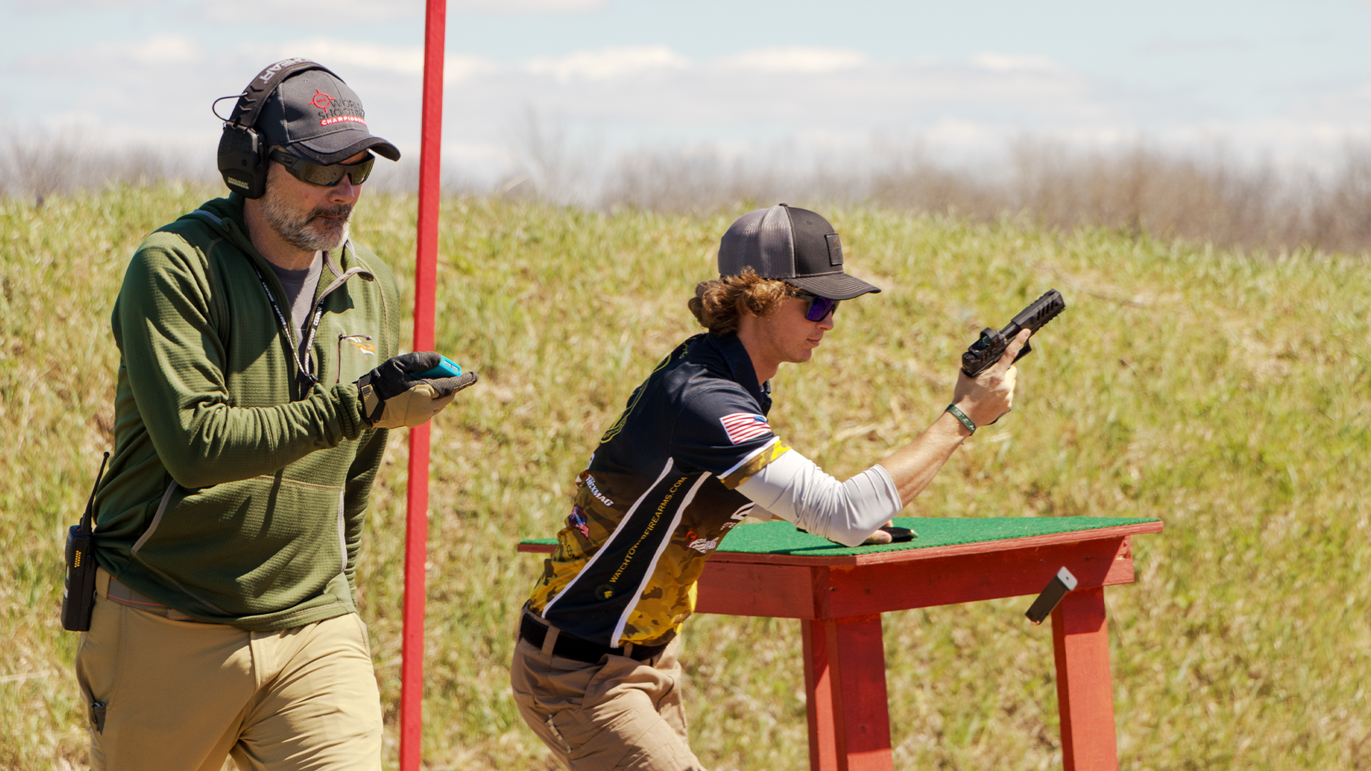 Shooter changing a mag on the move