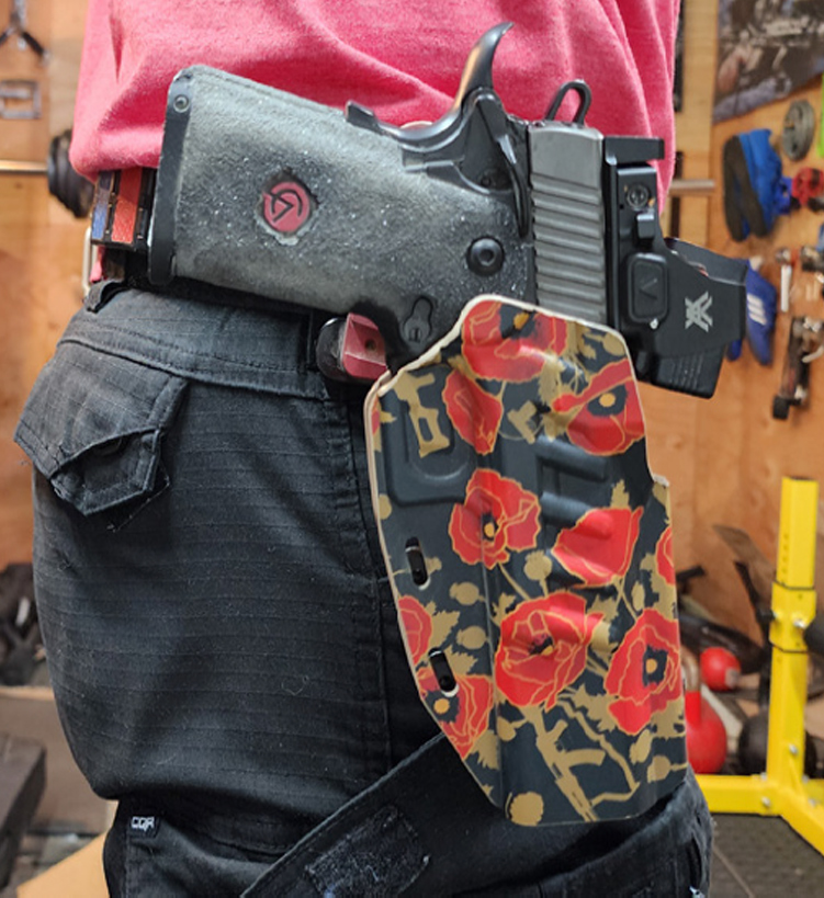 Holster with handgun