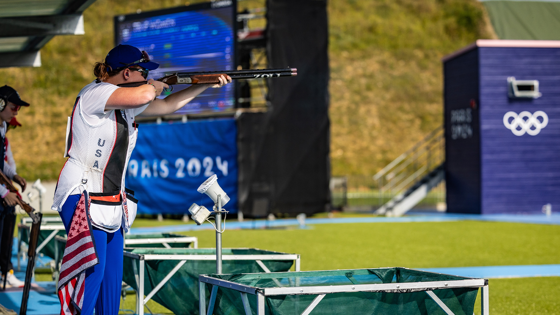 Ryann Phillips with gun