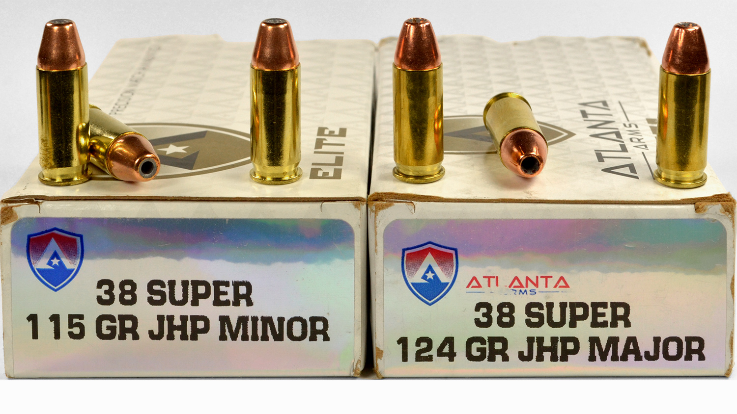 38, 9mm, and 22LR rounds with a large spent bullet casing - see